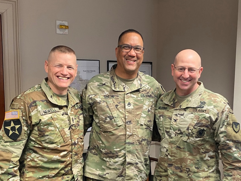 CSM Garth Newell, Staff Sgt Michael Smith, and Col Joseph Messina.