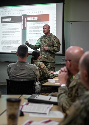 Lt. Col. Benjamin Nicholls, information operations coordinator for the 45th Field Artillery Brigade, Oklahoma Army National Guard, leads the “Social Wellness: Mentorship” breakout session during a Wellness Day event held at the Armed Forces Reserve Center in Norman, Oklahoma, May 7, 2024.and equip Soldiers and community partners with tools to promote holistic health and readiness for its service members. (Oklahoma National Guard photo by Cpl. Danielle Rayon)