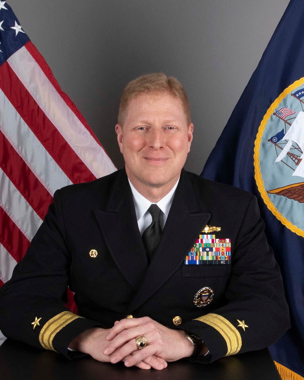 Official studio photo of Rear Adm. Tom Moninger, Commander, Carrier Strike Group 12