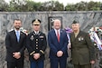 From left to right, Jack Bielak, Village of Norridge trustee; U.S. Army Reserve Lt. Col. Brian Dunn, 85th U.S. Army Reserve Support Command public affairs officer; Daniel Tannhauser, Village of Norridge president and Dennis Sass, U.S. Navy retired, pause for a photo outside the Village of Norridge Veterans Memorial.