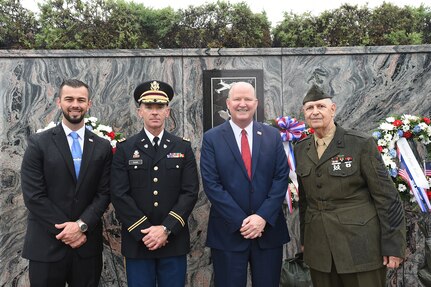 From left to right, Jack Bielak, Village of Norridge trustee; U.S. Army Reserve Lt. Col. Brian Dunn, 85th U.S. Army Reserve Support Command public affairs officer; Daniel Tannhauser, Village of Norridge president and Dennis Sass, U.S. Navy retired, pause for a photo outside the Village of Norridge Veterans Memorial.