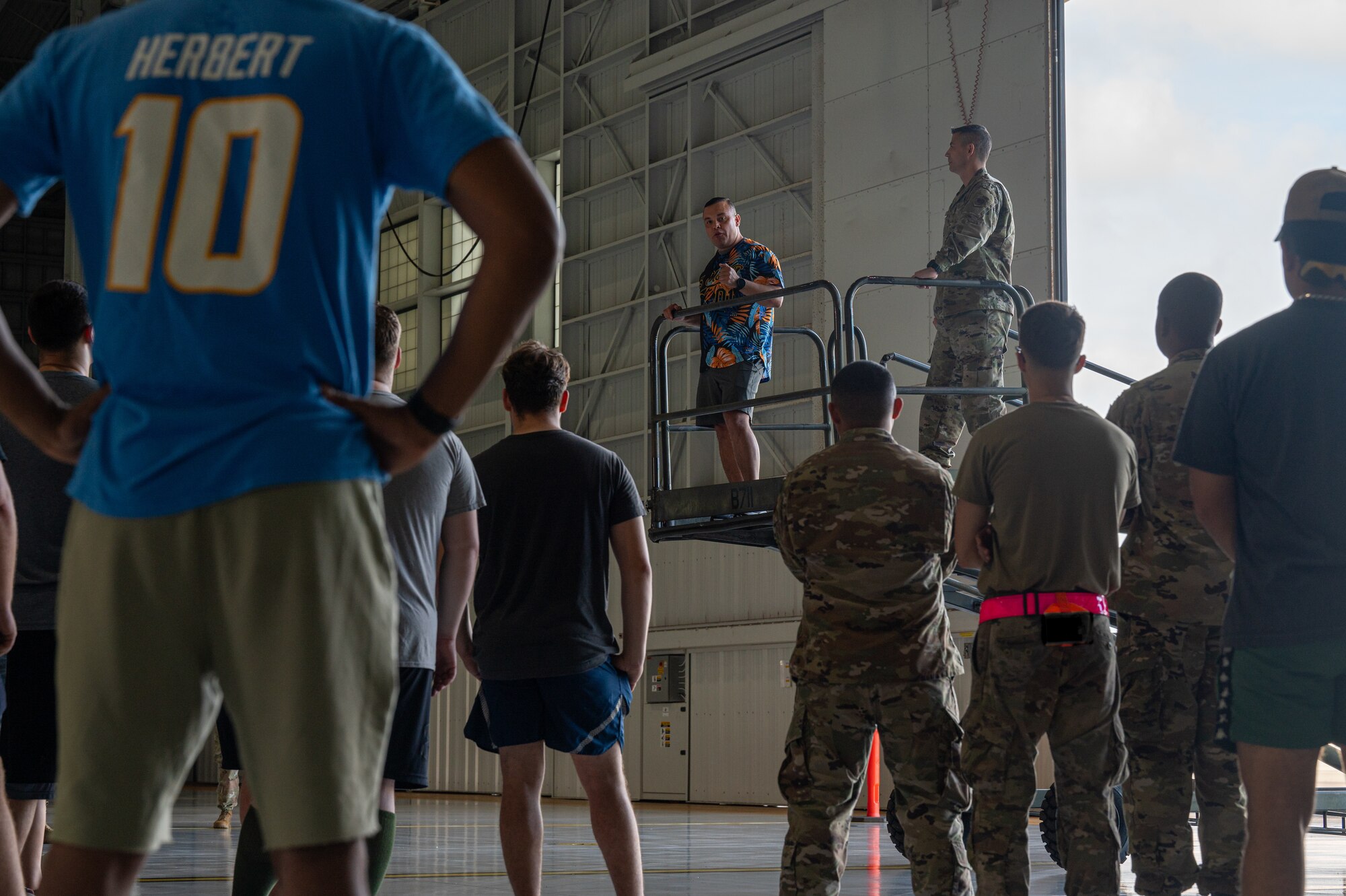 An Air Force group commander provides opening remarks during a morale event on Joint Base Pearl Harbor Hickam, Hawaii.