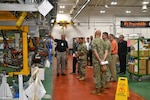 An employee explains the capabilities of the APU Test Facility.