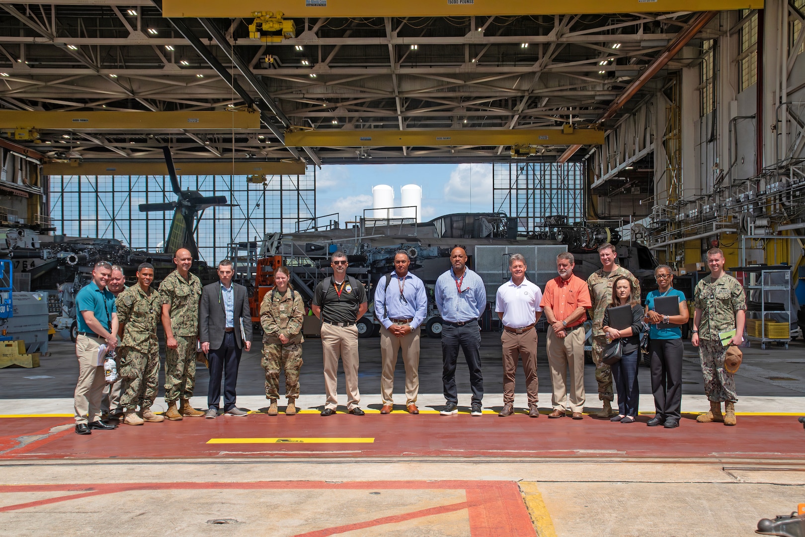 A group photo of attendees at the Industrial Support Activity Round Robin.