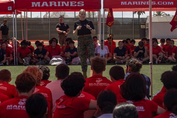 U.S. Marine Corps Maj. Shannon Gross, commanding officer of Recruiting Station San Diego, gives closing remarks to poolees during the RS San Diego annual pool function on Marine Corps Air Station Miramar, Calif., May 18, 2024. The annual pool function is an opportunity for poolees to build camaraderie, strengthen their commitment to the Marine Corps, and prepare for recruit training by competing in athletic competitions and receiving military related periods of instruction. (U.S. Marine Corps photo by Sgt. Jesula Jeanlouis)