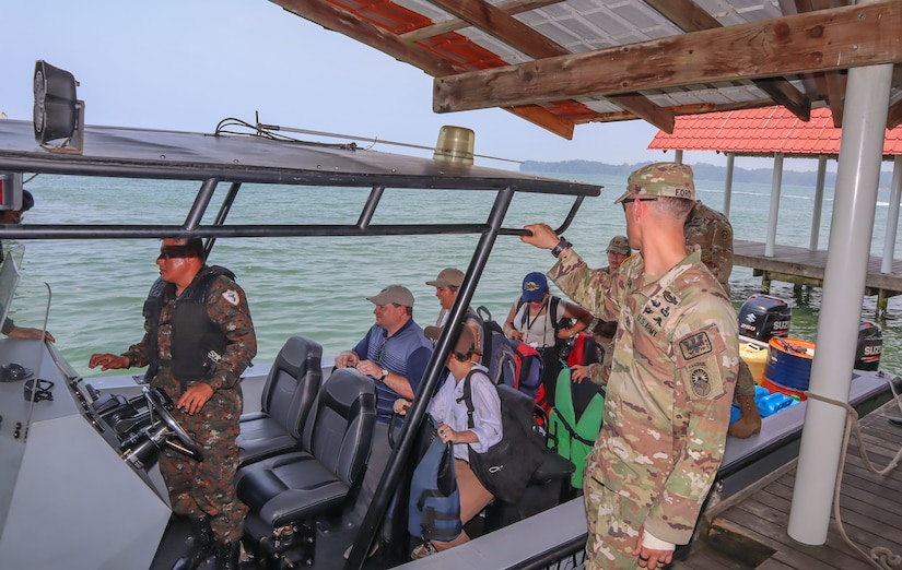 A photo of people on a boat.