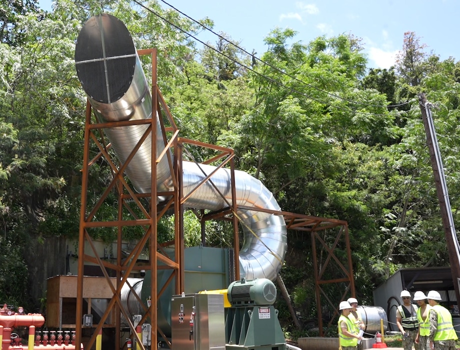 HALAWA, Hawaii (May 28, 2024) A temporary vent at the Red Hill Bulk Fuel Storage Facility (RHBFSF) undergoes final preparations before venting operations in Halawa, Hawaii, May 28, 2024. The vent was built to use fan power to pull fuel vapor from the fuel tanks inside the facility. After receiving approval from the Hawaii Department of Health (DOH), Navy Closure Task Force-Red Hill will begin tank cleaning operations by venting Tank 8 at the facility. The tank ventilation and air monitoring procedures have undergone rigorous modeling and regulatory scrutiny to ensure the safety of the surrounding community while allowing workers to safely enter and clean the interior of the tanks. Charged with the safe decommissioning of the RHBFSF, Navy Closure Task Force-Red Hill was established by the Department of the Navy as a commitment to the community and the environment. (U.S. Navy photo by Mass Communication Specialist 1st Class Glenn Slaughter)