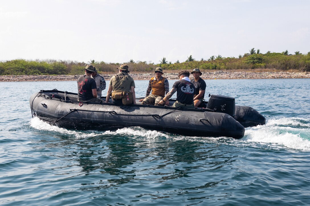Philippine Marine Corps explosive ordnance disposal technicians and U.S. Marine Corps EOD technicians with 1st EOD Company utilize a rigid hull inflatable boat to conduct underwater unexploded ordnance disposal demolitions off the coast of Caballo Island, Philippines, during Archipelagic Coastal Defense Continuum May 14, 2024. ACDC is a series of bilateral exchanges and training opportunities between U.S. Marines and Philippine Marines aimed at bolstering the Philippine Marine Corps’ Coastal Defense strategy while supporting the modernization efforts of the Armed Forces of the Philippines. This event marked the first time in U.S. Marine Corps EOD history that dive and demolition training on live underwater ordnance was conducted outside the continental United States. (U.S. Marine Corps photo by Staff Sgt. Dana Beesley)