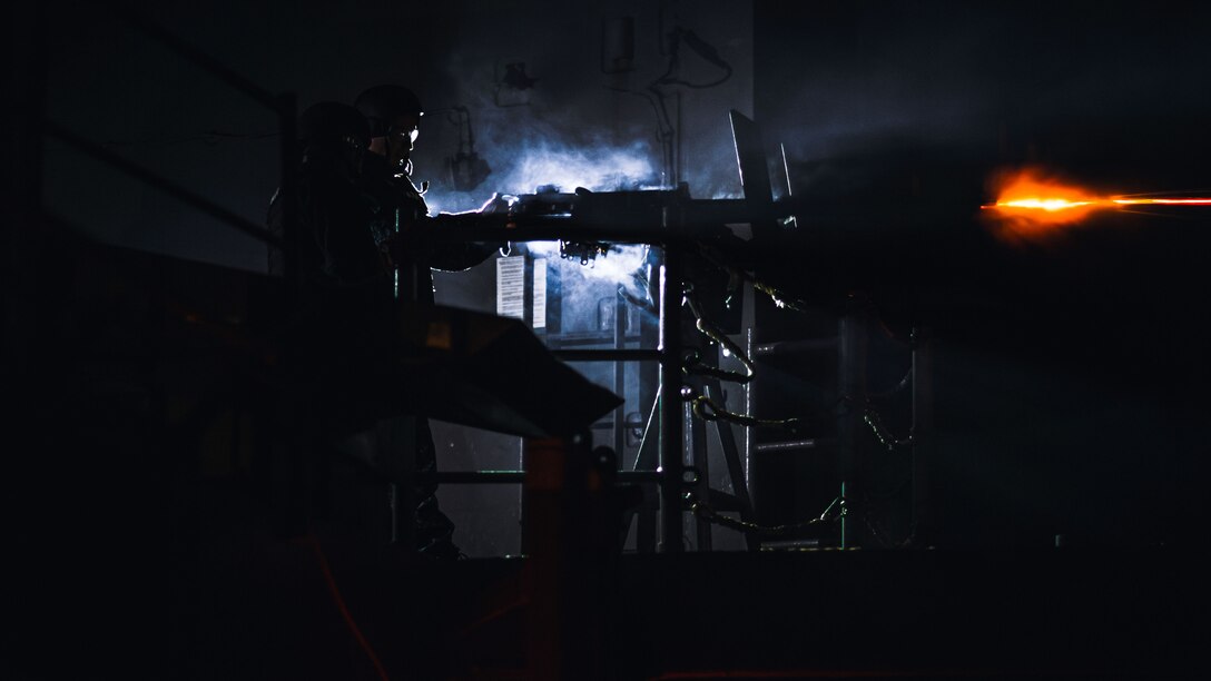 An Ecuadorian sailor fires a M2A1 .50-caliber machine gun aboard  USS George Washington (CVN 73) during exercise Southern Seas.