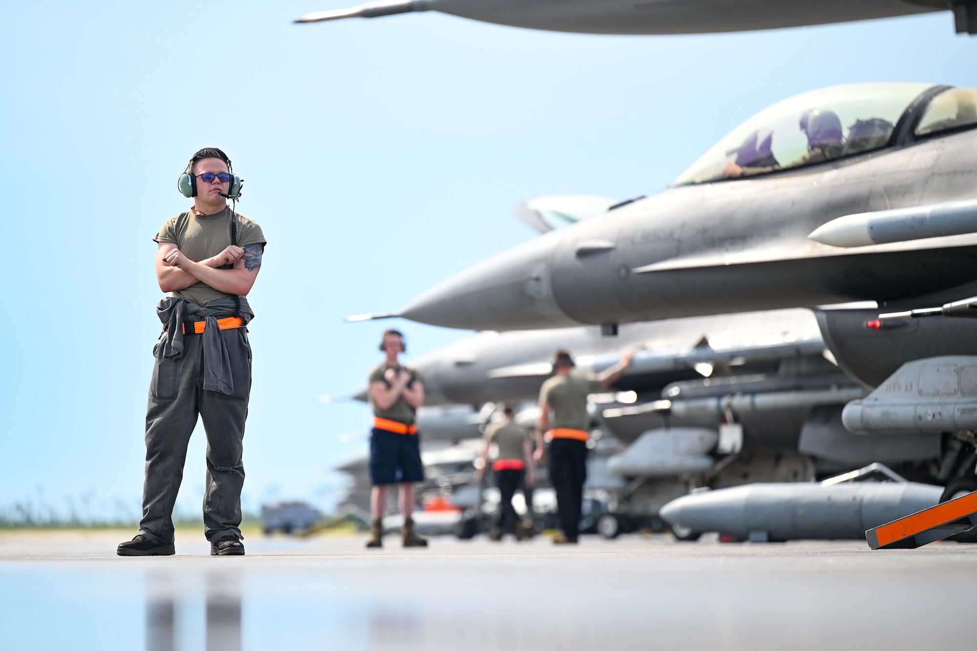 Crew chiefs prepare their aircraft for takeoff