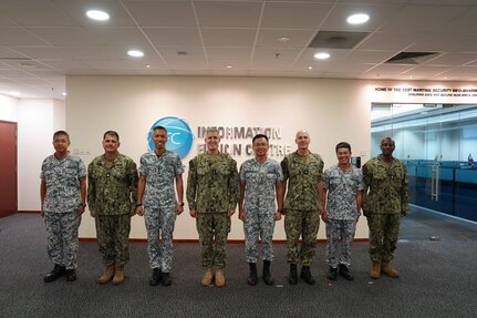 Adm. Stephen Koehler, commander, U.S. Pacific Fleet, center left, and Fleet Master Chief Don Davis, U.S. Pacific Fleet, right, meet with members of the Information Fusion Center at Changi Naval Base in Singapore, May 23, 2024.The visit to Singapore underscored the United States’ commitment to strengthening alliances and partnerships for an enduring resilient, free and open Indo-Pacific. (Photo courtesy of the Republic of Singapore Navy)