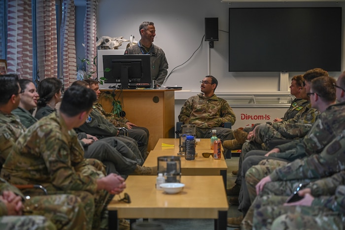 Royal Norwegian Air Force Maj. Pål-Christian Grosvold, 335th Squadron pilot, welcomes U.S. Air Force members assigned to the 61st Airlift Squadron to Norway at Station Group Gardermoen, Norway, May 9, 2024. Training with joint service members, and Allies and partners increases lethality and enhances interoperability, allowing forces to counter military aggression and coercion by sharing responsibilities for common defense.