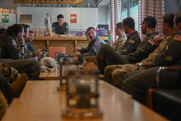 U.S. Air Force Airmen assigned to the 61st Airlift Squadron debrief with Royal Norwegian Air Force Airmen assigned to the 335th Squadron at Station Group Gardermoen, Norway, May 13, 2024. Training with joint service members, Allies and partners increases lethality and enhances interoperability, allowing forces to counter military aggression and coercion by sharing responsibilities for common defense.