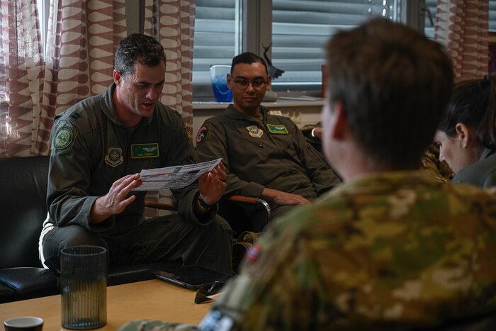 U.S. Air Force Capt. Cory Thomas, 61st Airlift Squadron pilot, leads a mission debrief with the Royal Norwegian Air Force 335th Squadron at Station Group Gardermoen, Norway, May 13, 2024. America's bilateral relationships with the Arctic nations are some of the nation's longest-held and most enduring relationships - militarily, diplomatically and commercially. The U.S. established relations with Norway in 1905.