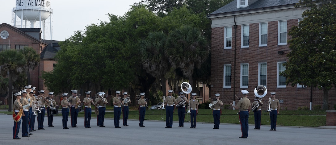 1st Lt. Jose Toranzo, the assistant director for “The President's Own” US Marine Band, directs the graduation colors ceremony on Marine Corps Recruit Depot Parris Island, S.C., May 17, 2024. The morning colors ceremony is often the first chance for the families of the graduating Marines to observe the conduct of colors aboard a military installation.