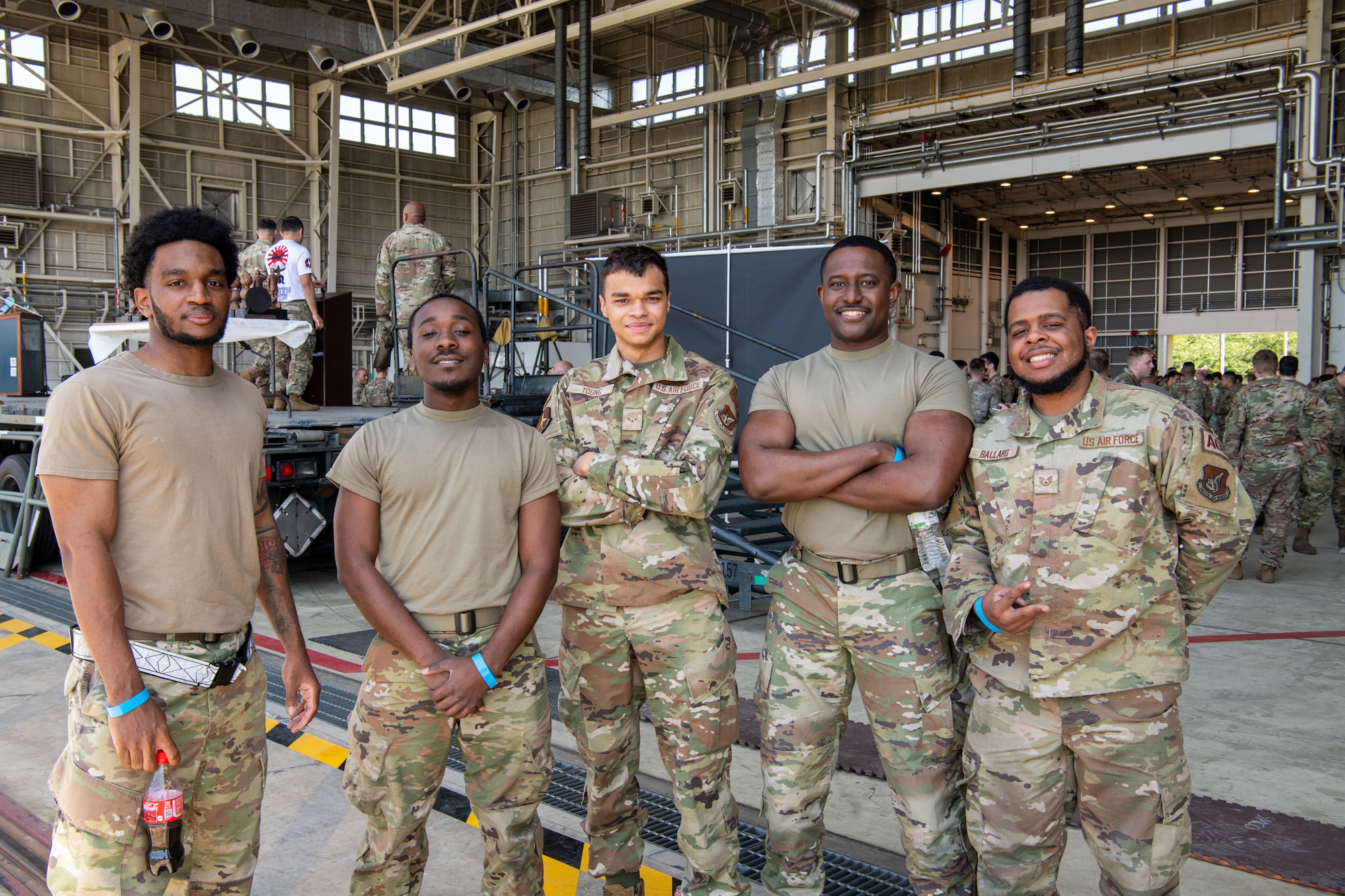 Airmen assigned to the 374th Maintenance Group pose for a photo during the Maintenance Professional of the Year celebration.