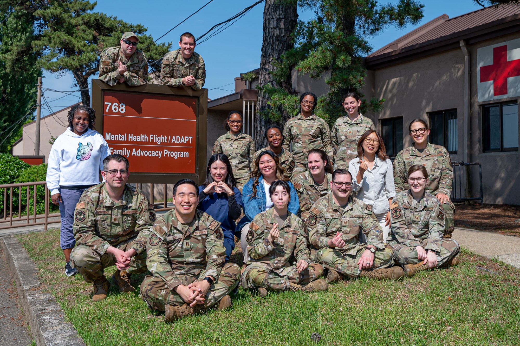 Members assigned to the 51st Medical Group mental health flight pose for a group photo at Osan Air Base, Republic of Korea, May 29, 2024. The 51st Fighter Wing offers a variety of resources ranging from family advocacy to substance abuse services. These resources ensure that Airmen and families of the 51st FW receive the care and support they need. (U.S. Air Force photo by Senior Airman Brittany Russell)
