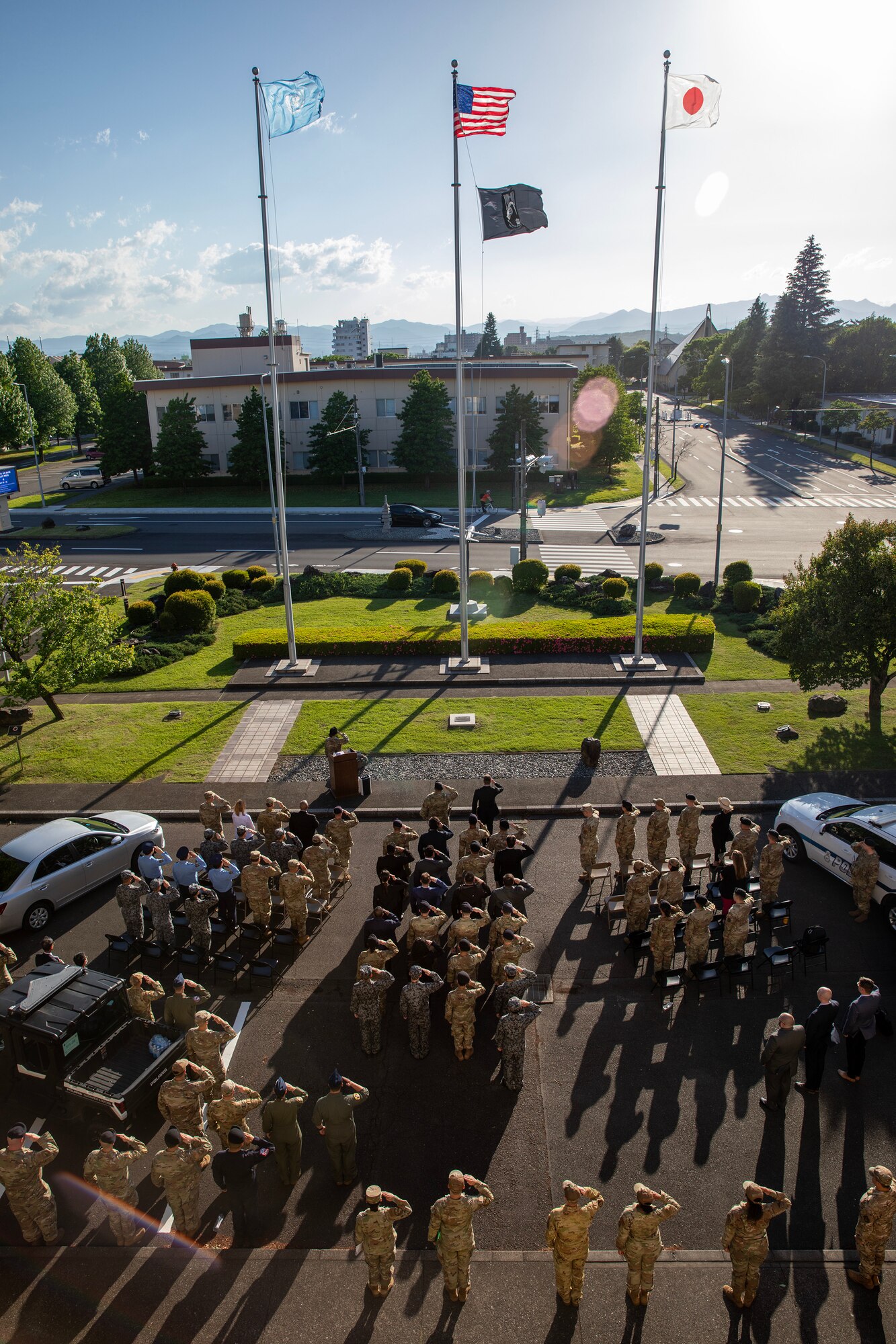 Members of law enforcement salute.