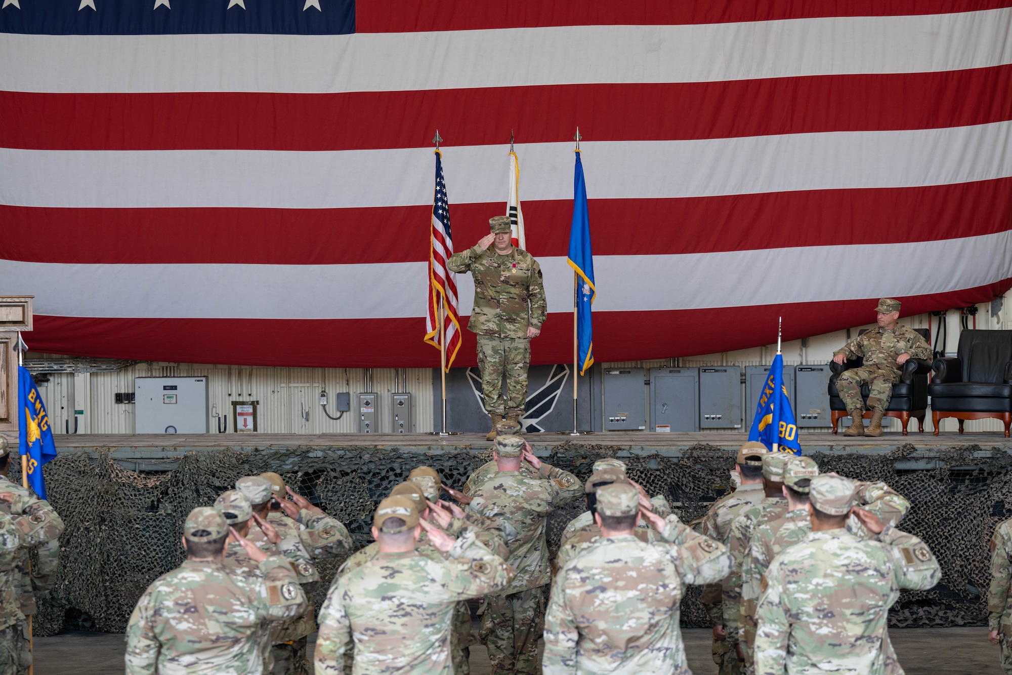 Col. Bradley Altman, 8th Maintenance Group outgoing commander, renders his last salute as the commander during the 8th MXG change of command ceremony at Kunsan Air Base, Republic of Korea.