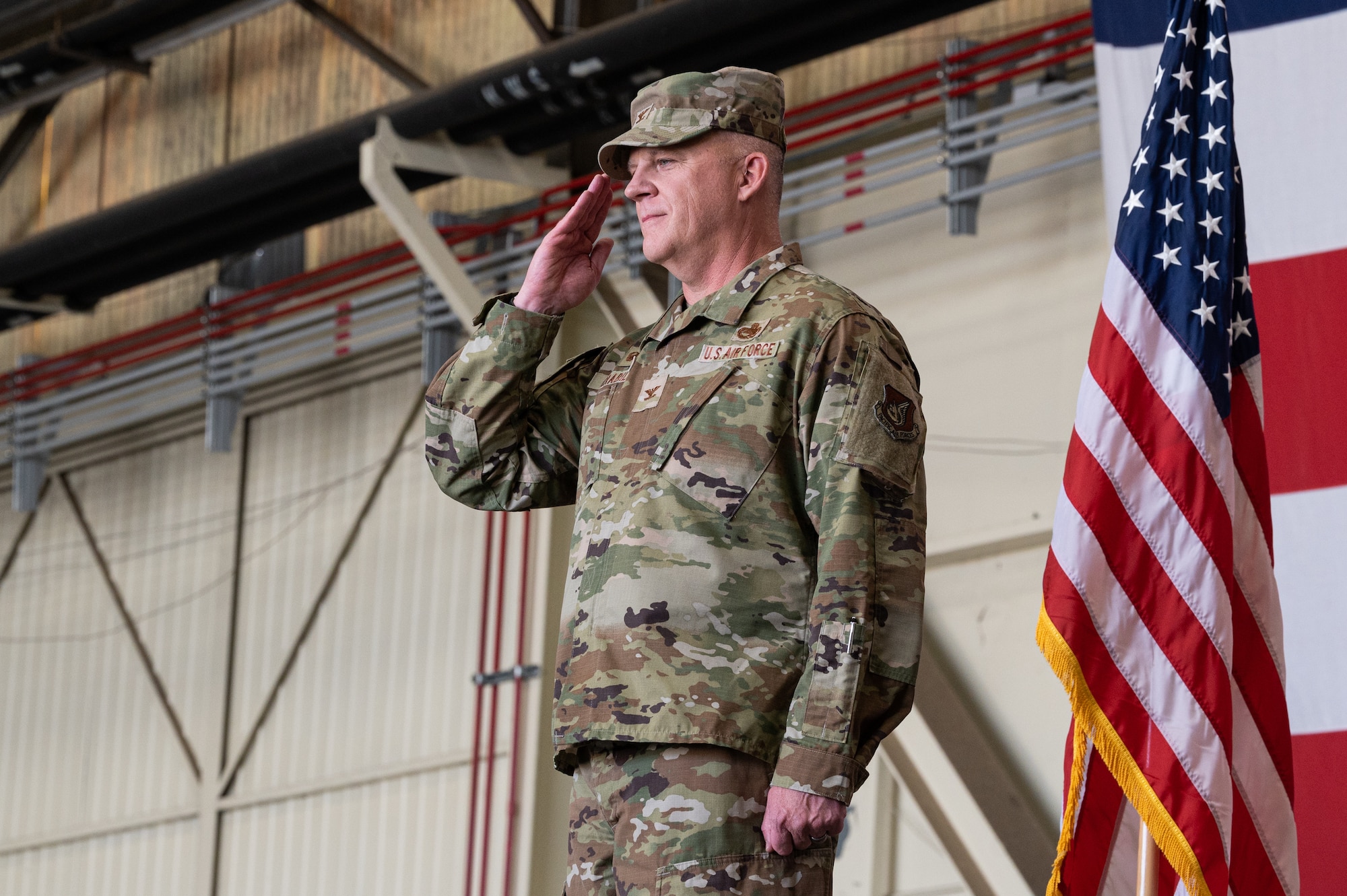 Col. Casey Crabill, 8th Maintenance Group incoming commander, renders his first salute as commander during the 8th MXG change of command ceremony at Kunsan Air Base, Republic of Korea.
