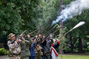 Event participants perform the 21-gun salute at the Sunset Hill Cemetery Memorial Day service in Valdosta, Georgia, May 27, 2024. Memorial Day serves as a chance to pause, reflect, and honor the women and men who gave it all while defending our nation. (U.S. Air Force photo by Airman 1st Class Leonid Soubbotine)