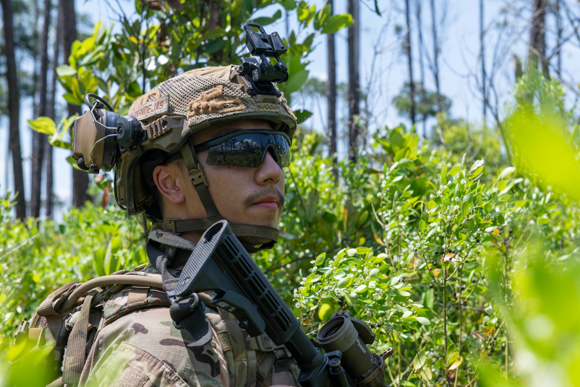 Airman kneels