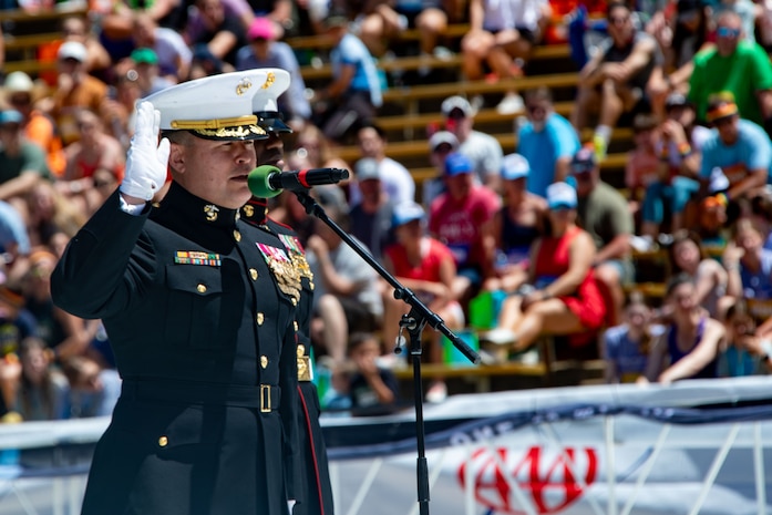 U.S. Marine Corps Col. Robert Bordisch Jr., director, Naval Reserve Officer Training Corps program, University of Colorado Boulder, conducts an oath of enlistment ceremony for poolees from Recruiting Station Denver during a Memorial Day ceremony following the BOLDERBoulder 10-kilometer race at Boulder Colorado, May 27, 2024. Marine Corps Recruit Depot San Diego and Western Recruiting Region sent Marines to represent the command during the 2024 BOLDERBoulder 10k race to engage with the local community and showcase the spirit of the organization. (U.S. Marine Corps photo by Master Sergeant Ezekiel R. Kitandwe)