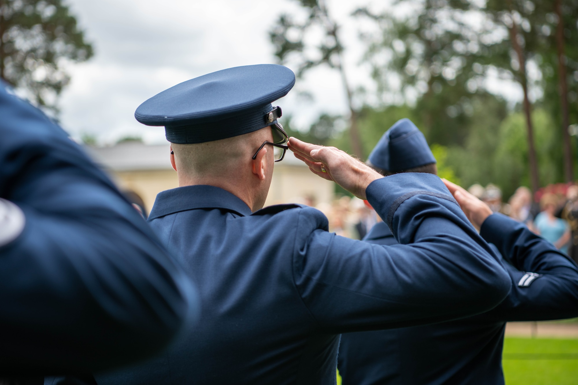 Pathfinders salute during a Memorial Day ceremony