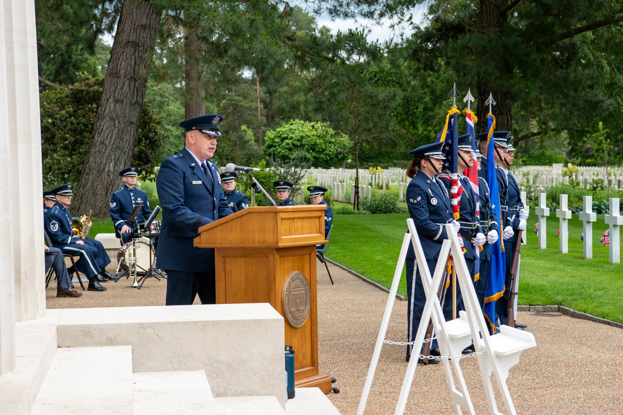 An emcee speaks during a Memorial Day ceremony