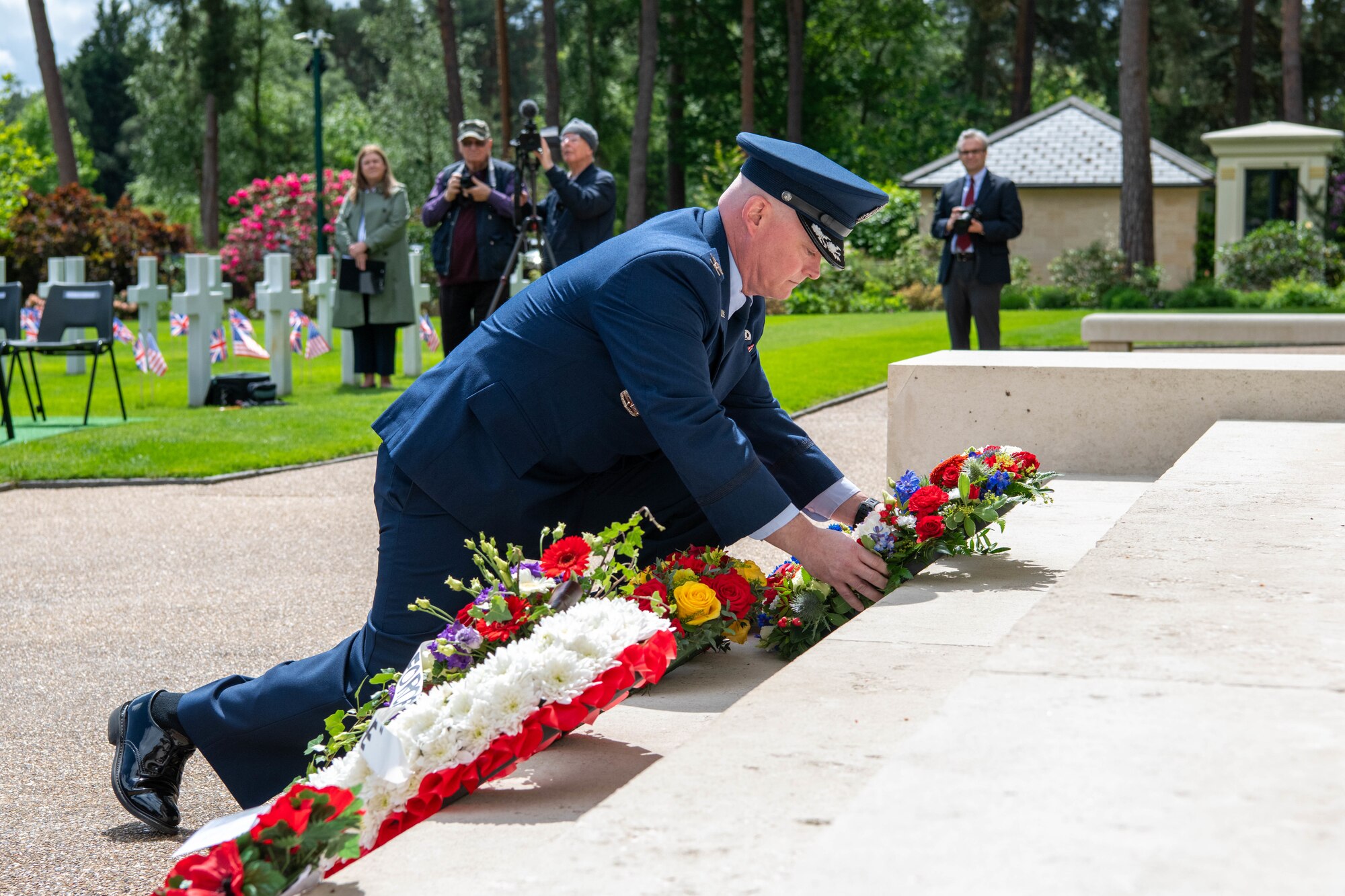 An Airman lays a wreath during a Memorial Day ceremony