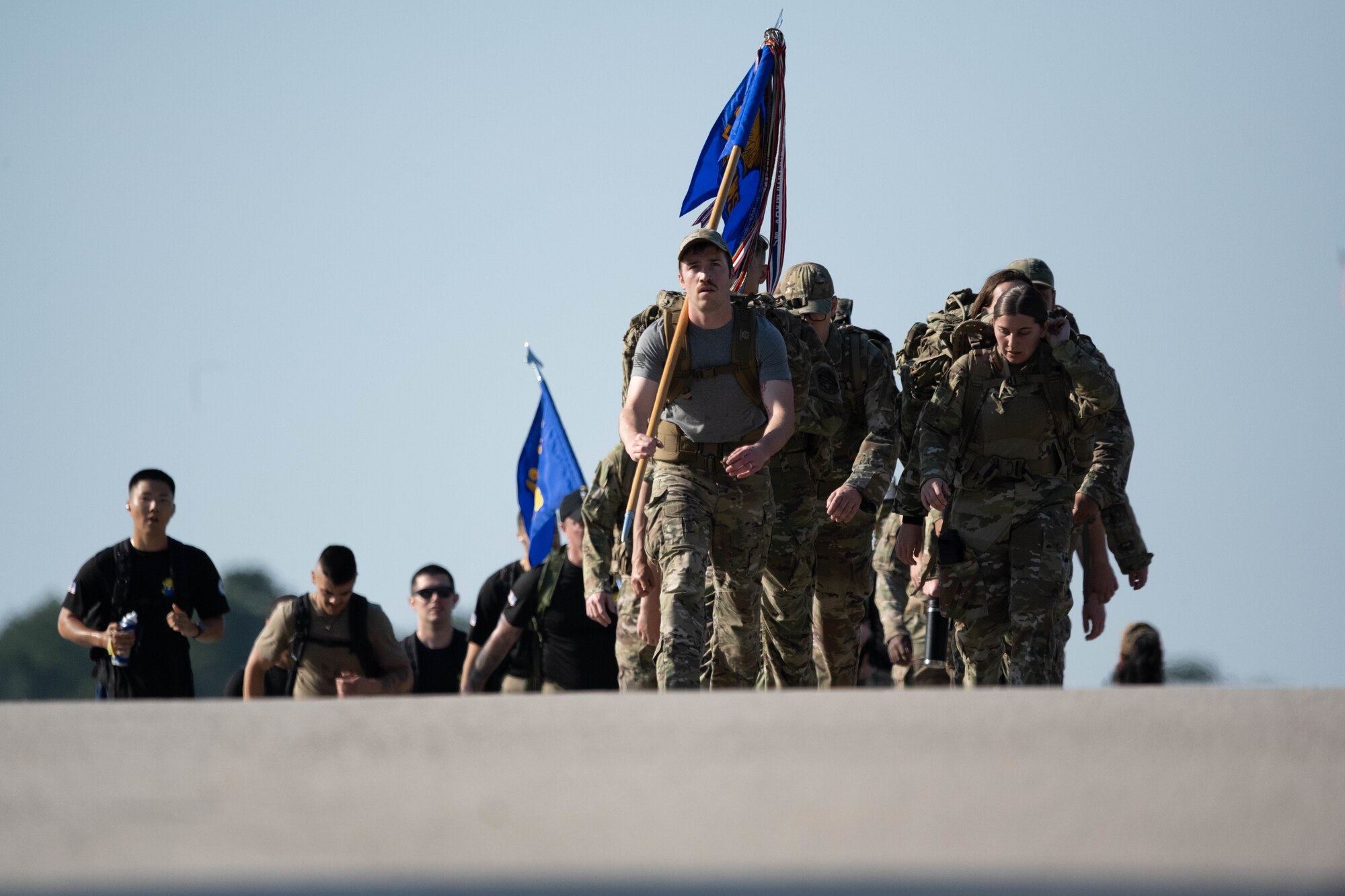 Air Force Airmen take part in ruck march