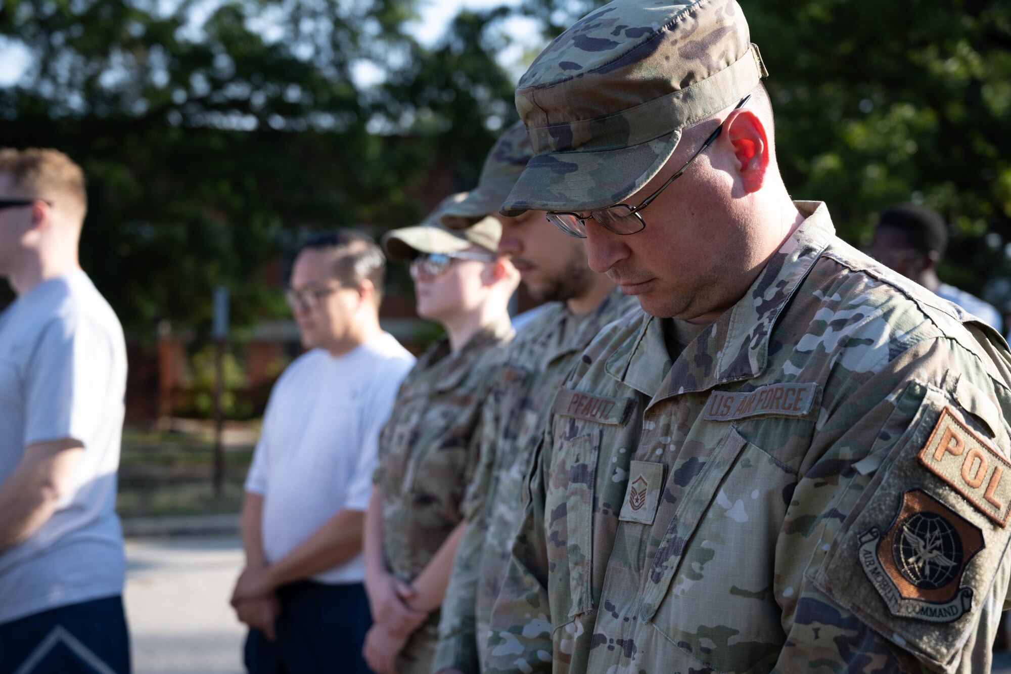 Air Force Airman takes part in moment of silence
