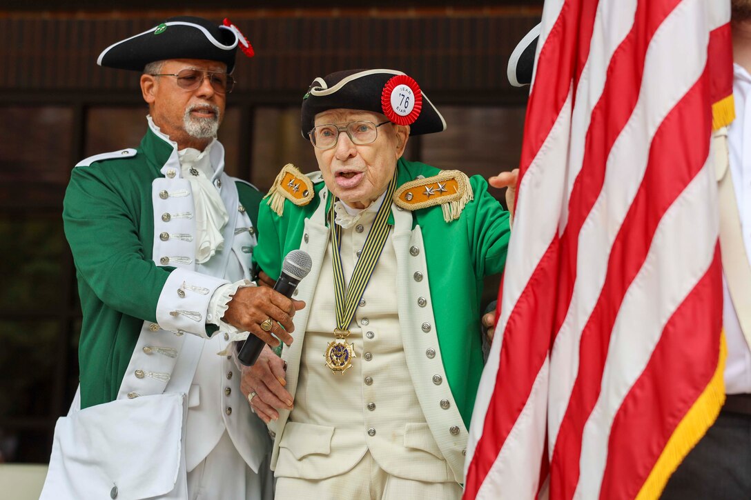 Frank W. Harris III, retired U.S. Marine Corps colonel, gives A Toast to the Flag during the 2024 Memorial Day Ceremony at the National Memorial Cemetery at Quantico, Triangle, VA, May 27, 2024. Memorial Day is a National Day of Remembrance to the service members who have given ultimate sacrifice. (U.S. Marine Corps photo by Sgt. Miranda C. DeKorte)