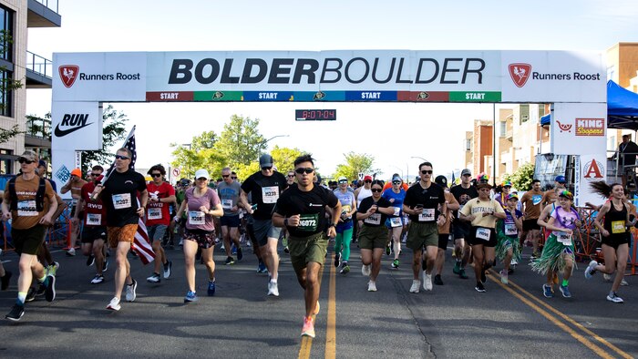 U.S. Marine Corps Cpl. Joshua Dreher, a combat graphics specialist with Headquarters Company, Marine Corps Recruit Depot San Diego, takes off during the BOLDERBoulder 10-kilometer race, at Boulder Colorado, May 27, 2024. MCRDSD and Western Recruiting Region are sending Marines to represent the depot during the 2024 BOLDERBoulder 10k race to engage with the local community and showcase the spirit of our organization. (U.S. Marine Corps photo by Sgt. Yvonna Guyette)