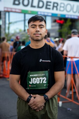 U.S. Marine Corps Cpl. Joshua Dreher, a combat graphics specialist with Headquarters Company, Marine Corps Recruit Depot San Diego, poses for a photo before running in the BOLDERBoulder 10-kilometer race, at Boulder Colorado, May 27, 2024. MCRDSD and Western Recruiting Region are sending Marines to represent the depot during the 2024 BOLDERBoulder 10k race to engage with the local community and showcase the spirit of our organization. (U.S. Marine Corps photo by Sgt. Yvonna Guyette)