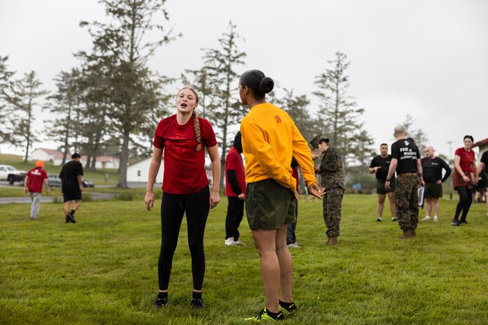 A U.S. Marine Corps poolee receives commands from Staff Sgt. Celise Phillips, a drill instructor with 2nd Recruit Training Battalion, Marine Corps Recruit Depot San Diego, during a pool function at Camp Rilea Armed Forces Training Center in Warrenton, Oregon, May 18, 2024. Pool functions are held to prepare poolees for the mental and physical rigors of recruit training. (U.S. Marine Corps photo by Cpl. Andrew Bray)