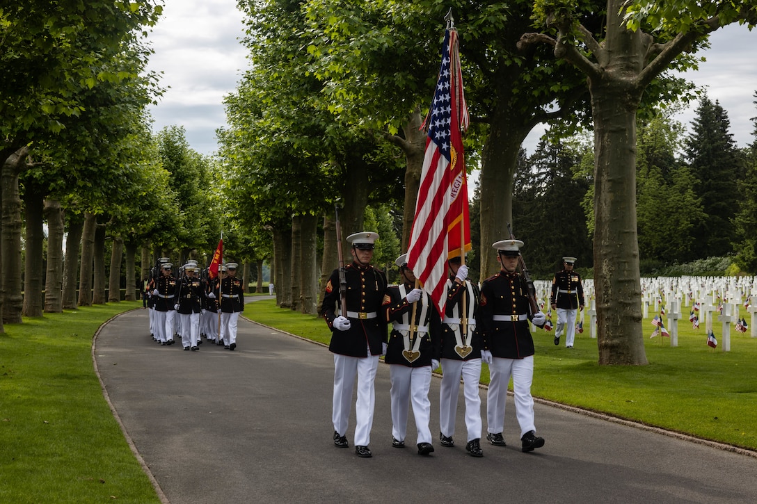 U.S. Marines with 6th Marine Regiment, 2d Marine Division march in formation during a ceremony at Aisne-Marne American Cemetery, Belleau, France, May 26, 2024. The memorial ceremony was held in commemoration of the 106th anniversary of the battle of Belleau Wood, conducted to honor the legacy of service members who gave their lives in defense of the United States and European allies. (U.S. Marine Corps photo by Sgt. Alexa M. Hernandez)