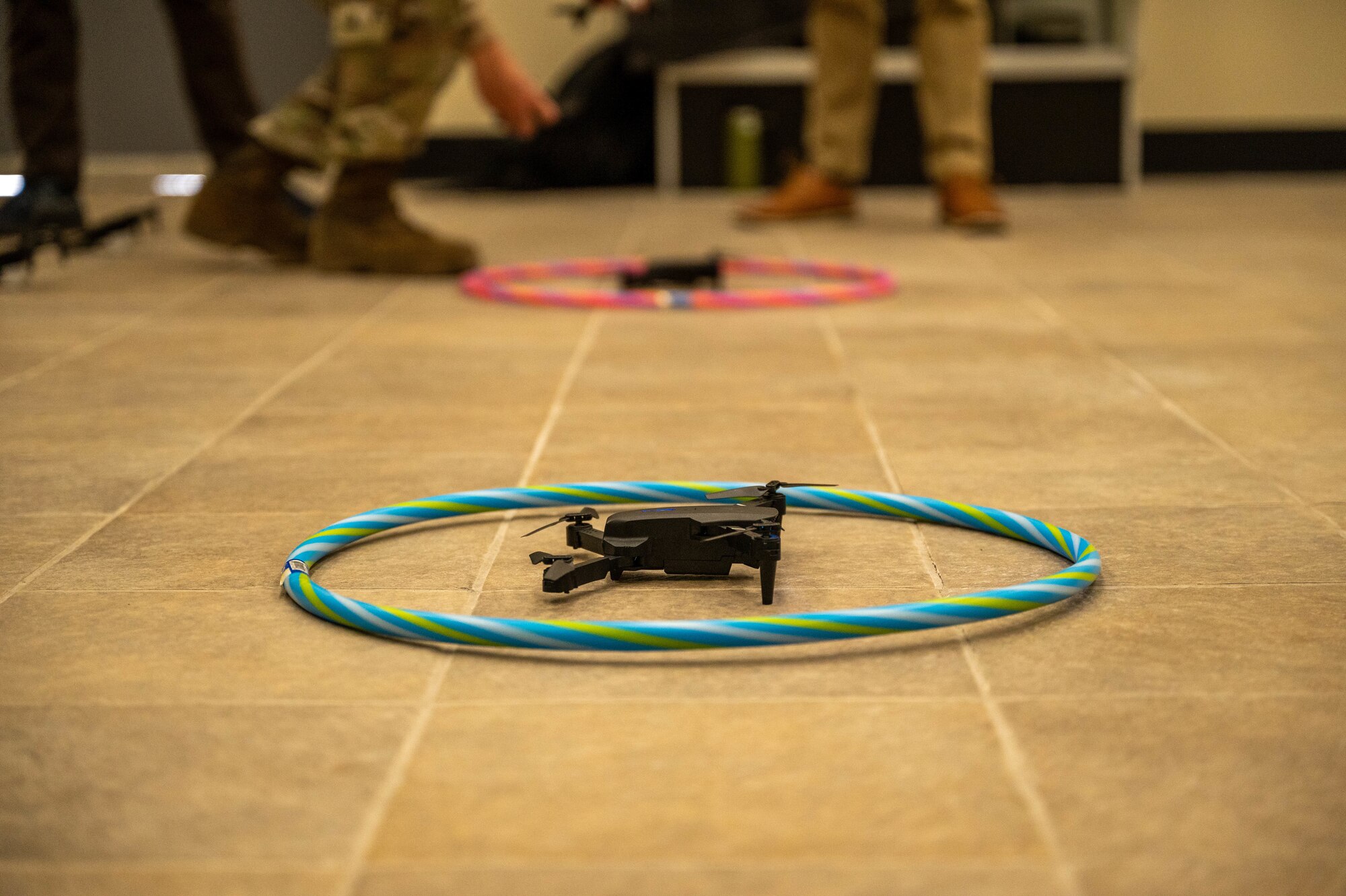 Two small unmanned aerial systems piloted by Airmen assigned to the 56th Fighter Wing wait to takeoff during the 56th FW’s first Combat Airpower for All Airmen class, May 29, 2024, at Luke Air Force Base, Arizona.