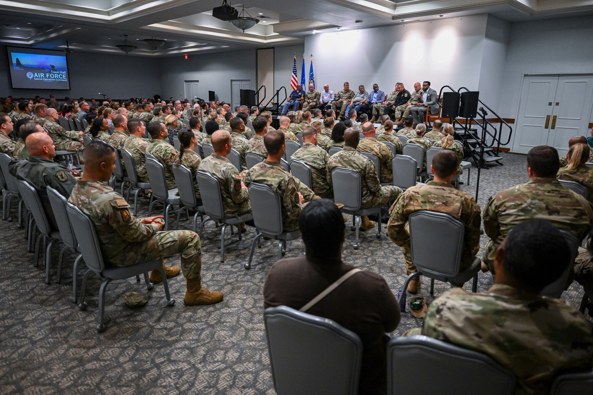 Felix Cole, senior pastor of Beulah First Baptist Church, addresses Air Commandos during a town hall at Hurlburt Field, Florida, May 30, 2024. Air Force Special Operations Command leadership, along with community leaders, held  the town hall to discuss the recent shooting incident involving an Okaloosa County Sheriff’s Department deputy resulting in the death of SrA Roger Fortson May 3rd. (U.S. Air Force photo by Staff Sgt. Caleb Pavao)