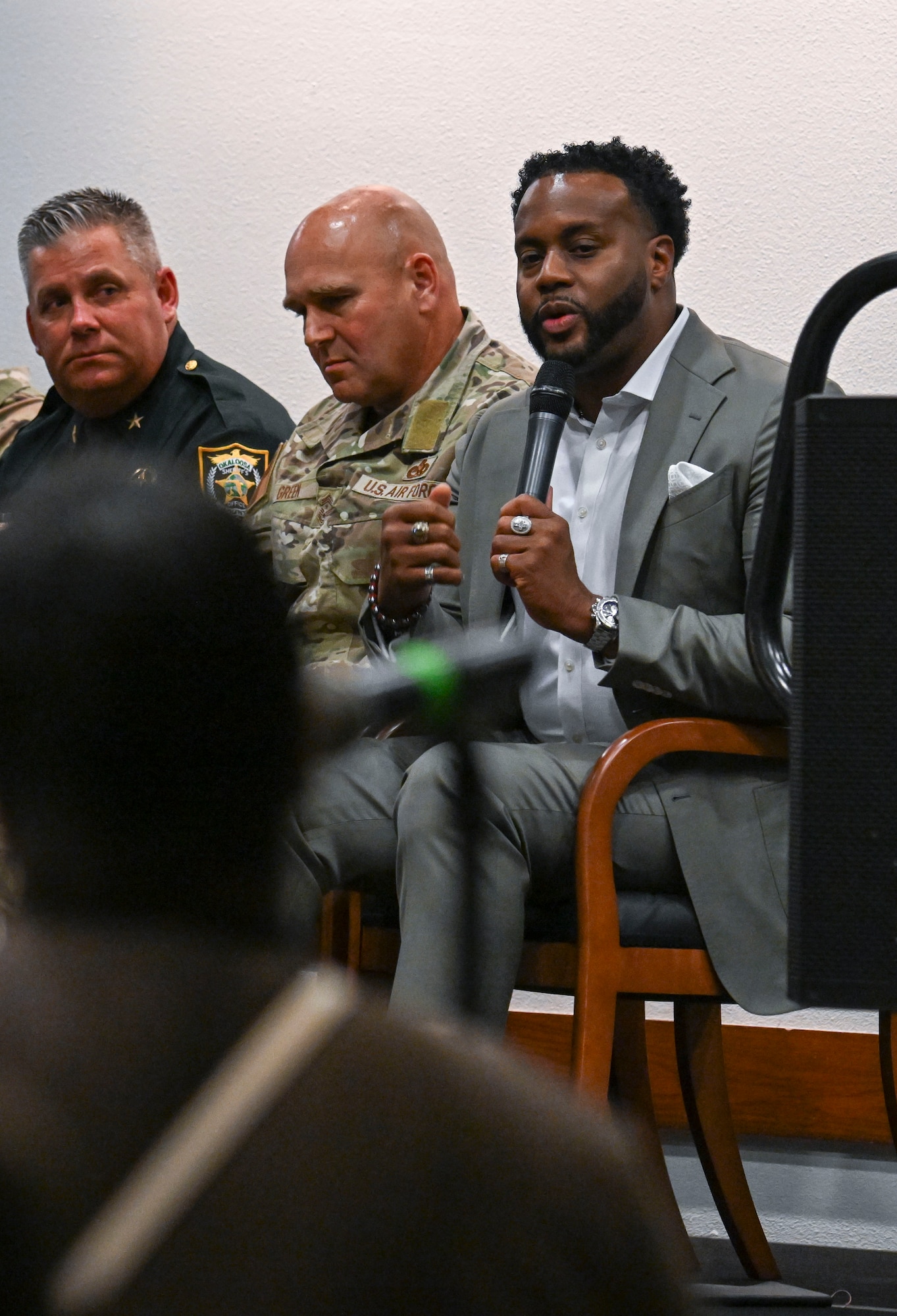 Felix Cole, senior pastor of Beulah First Baptist Church, answers a question during a town hall at Hurlburt Field, Florida, May 30, 2024. Air Force Special Operations Command leadership, along with community leaders, held the town hall to discuss the recent shooting incident involving an Okaloosa County Sheriff’s Department deputy resulting in the death of SrA Roger Fortson May 3rd. (U.S. Air Force photo by Staff Sgt. Caleb Pavao)