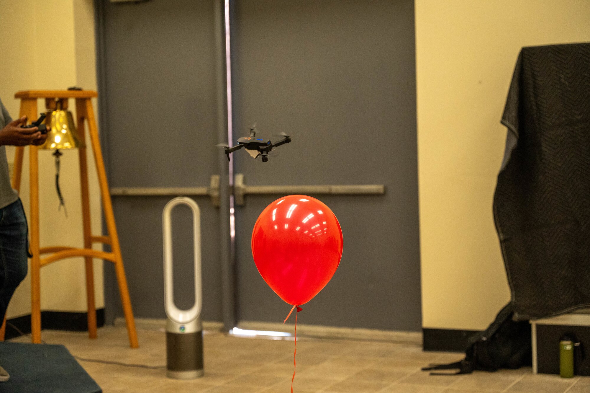 A small unmanned aerial system, piloted by an Airman assigned to the 56th Fighter Wing, attacks a balloon target during the 56th FW’s first Combat Airpower for All Airmen class, May 29, 2024, at Luke Air Force Base, Arizona.