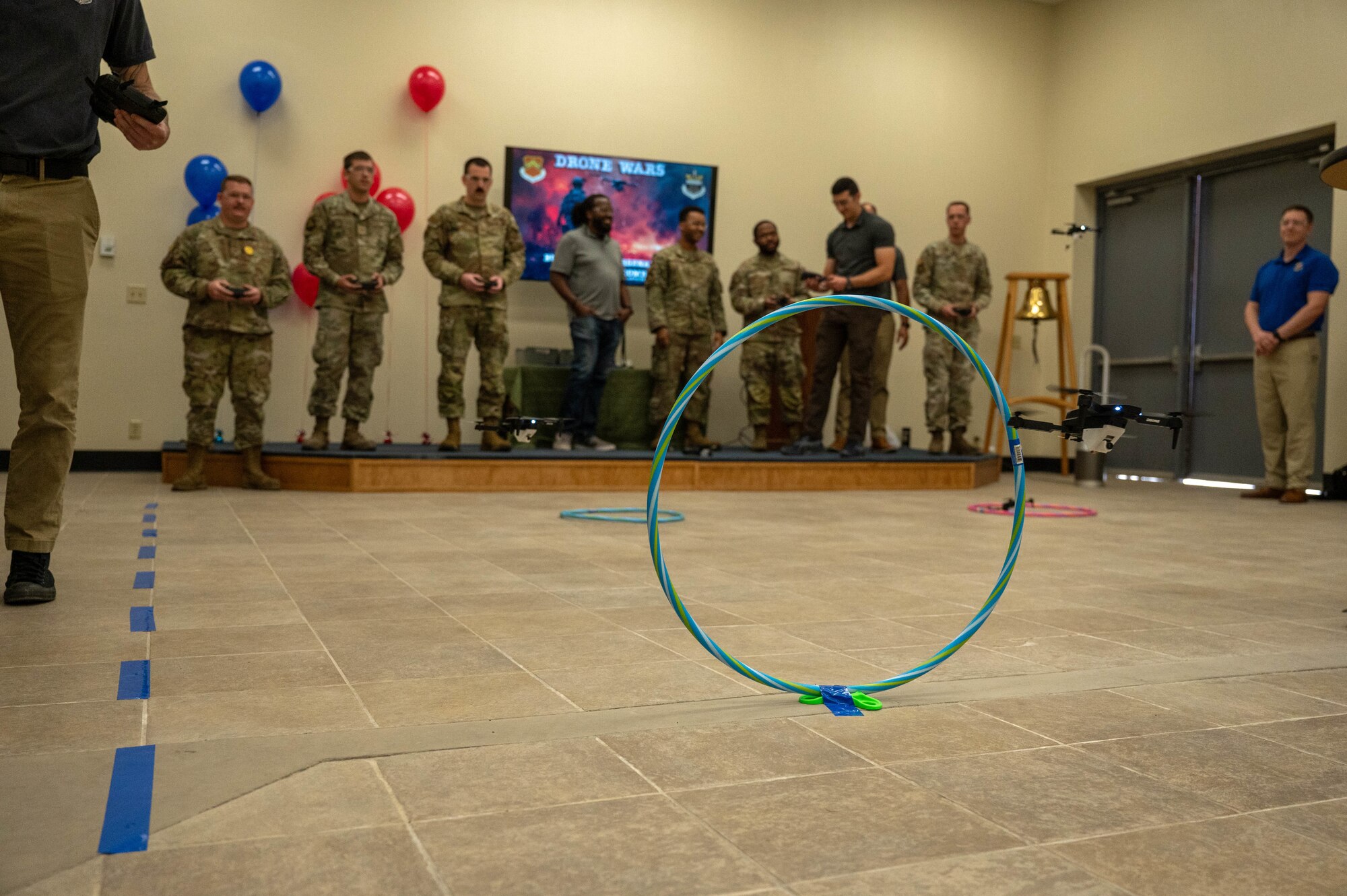 U.S. Air Force Airmen assigned to the 56th Fighter Wing pilot small unmanned aerial systems through an obstacle course, May 29, 2024, at Luke Air Force Base, Arizona.