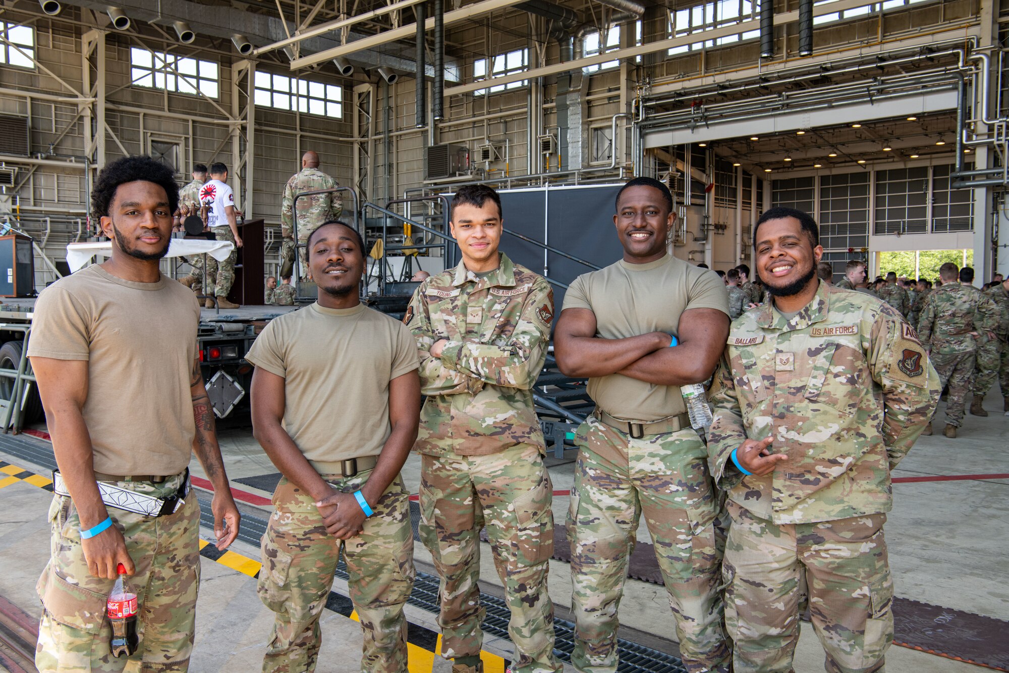 Airmen assigned to the 374th Maintenance Group pose for a photo during the Maintenance Professional of the Year celebration.