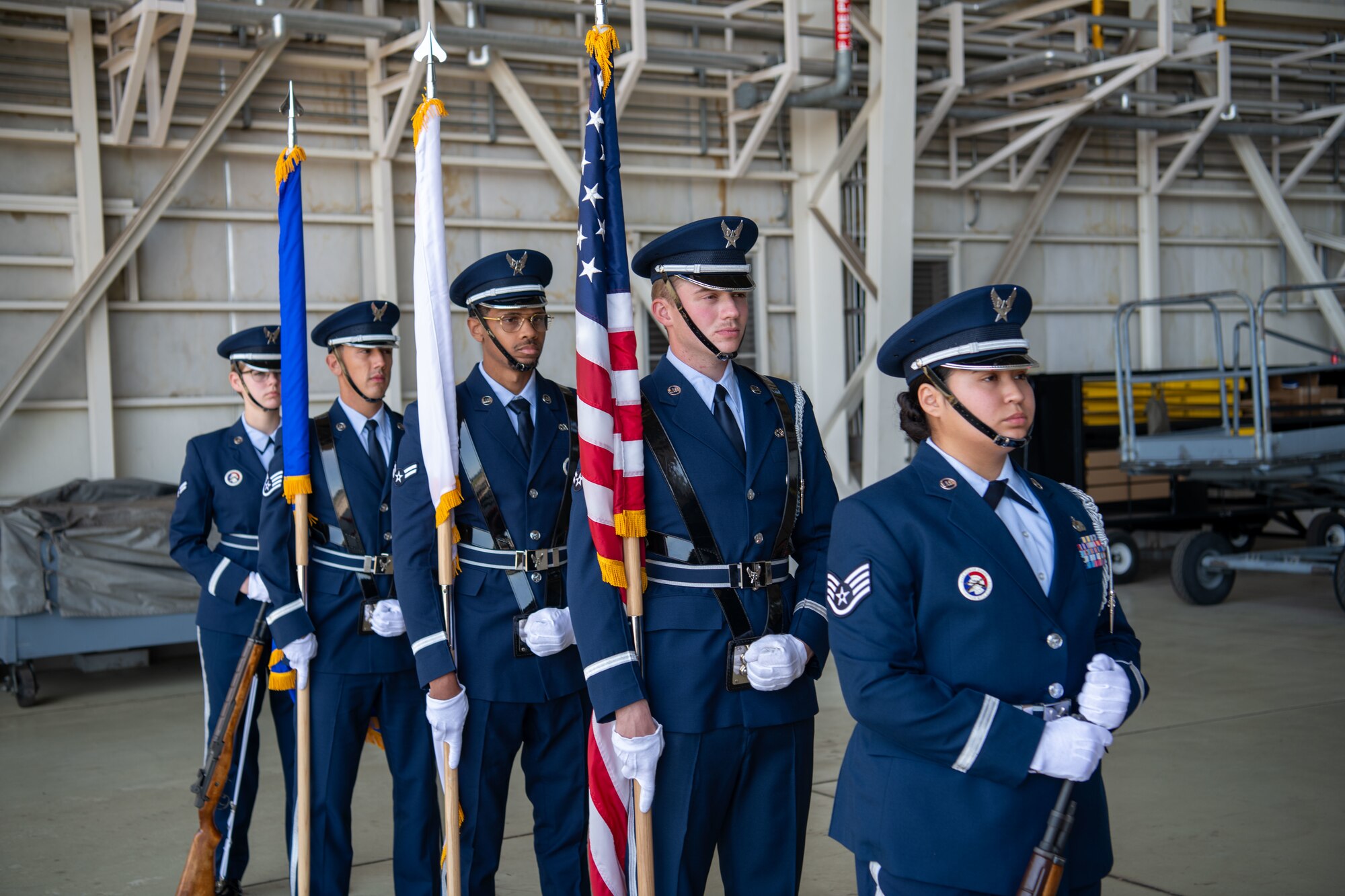 Airmen from the Yokota Air Base Honor Guard prepares to present colors at the Maintenance Professional of the Year Ceremony.
