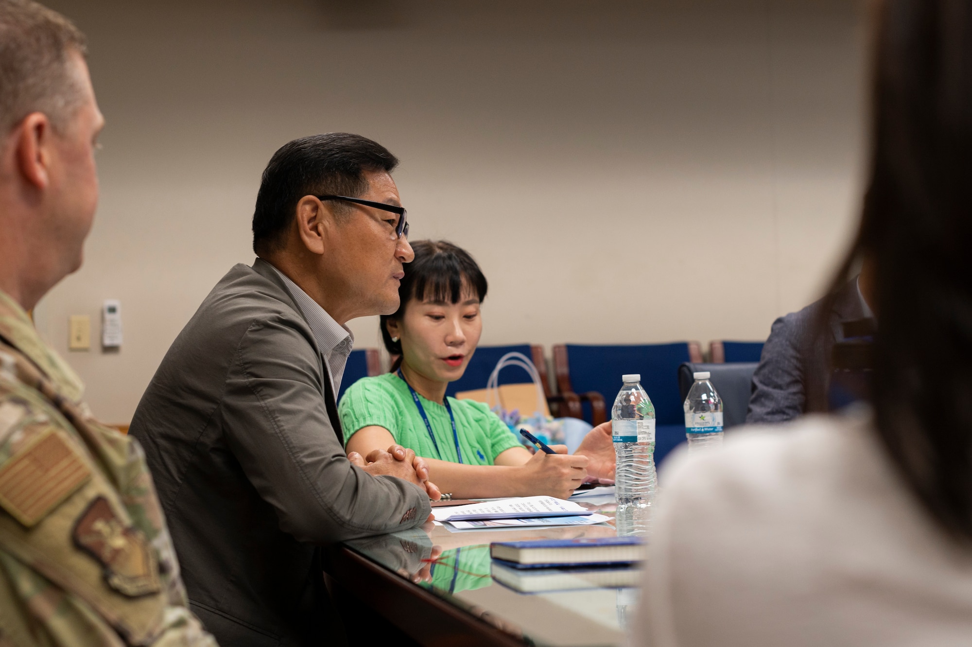 Republic of Korea Congressman Hong Ki-Won, addresses community concerns with 51st Fighter Wing leaders during the Osan Air Base and Songtan Community Advisory Council meeting at Osan AB, Republic of Korea, May 30, 2024. This collaborative meeting aims to address concerns and improve quality of life for city residents and base personnel. (U.S. Air Force photo by Senior Airman Kaitlin Frazier)