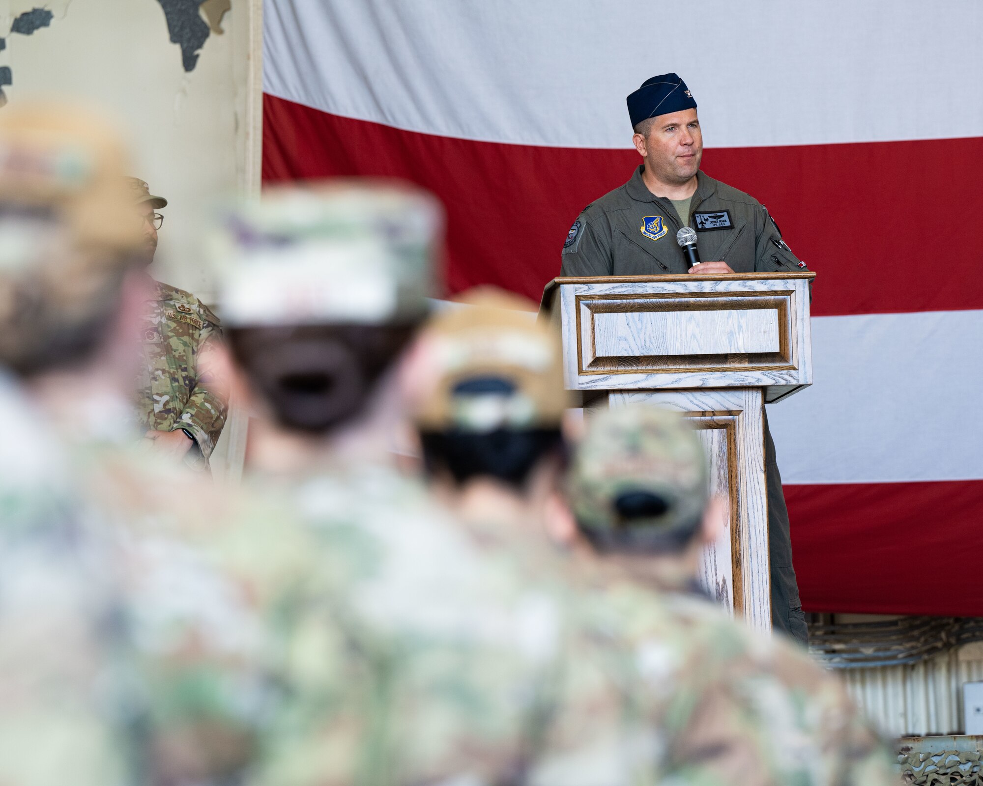Col. Derrick Franck, 8th Operations Group incoming commander, addresses members of the 8th OG during a change of command ceremony.