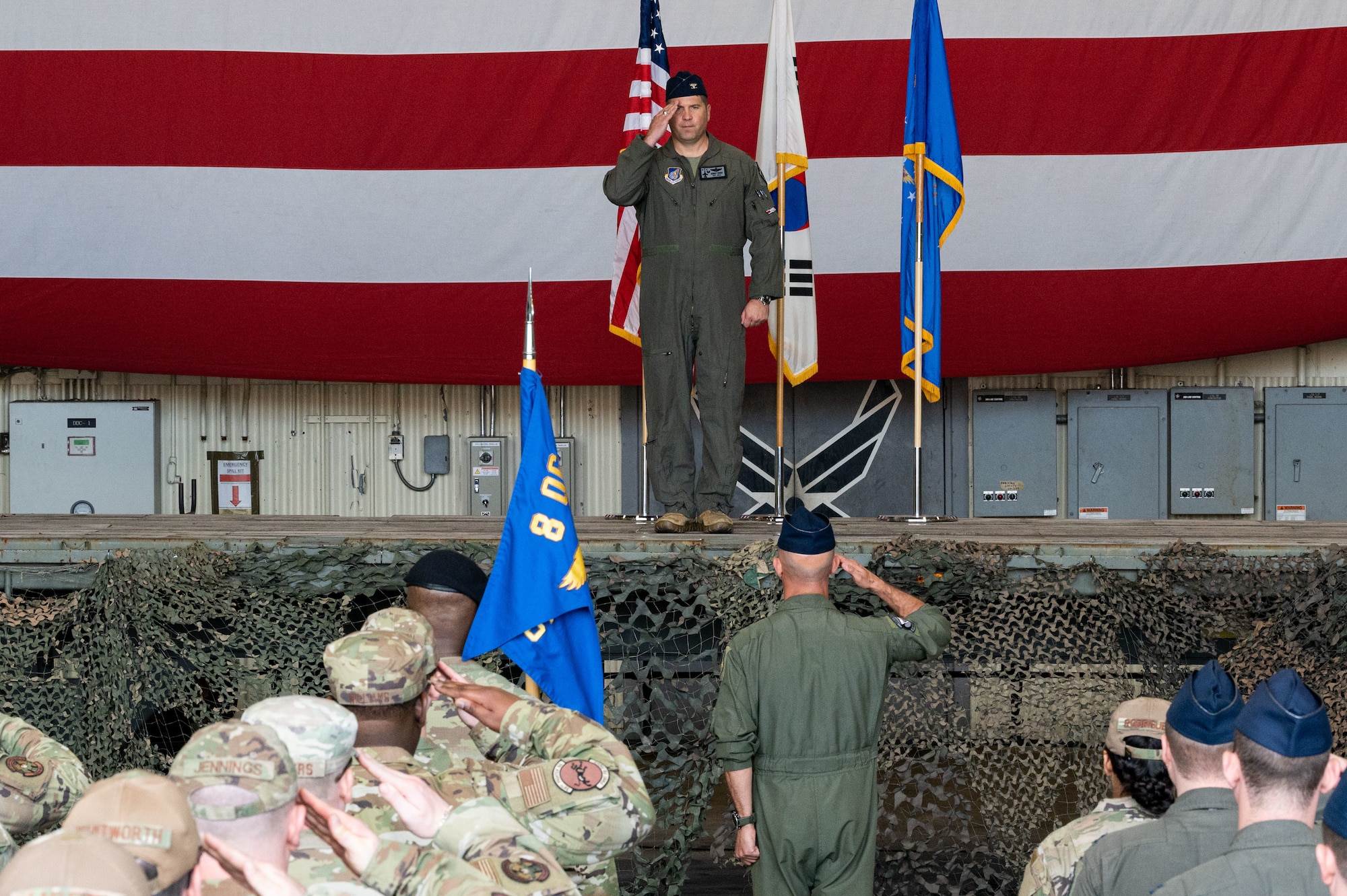 Col. Derrick Franck, 8th Operations Group incoming commander, renders his first salute as commander during the 8th OG change of command ceremony.