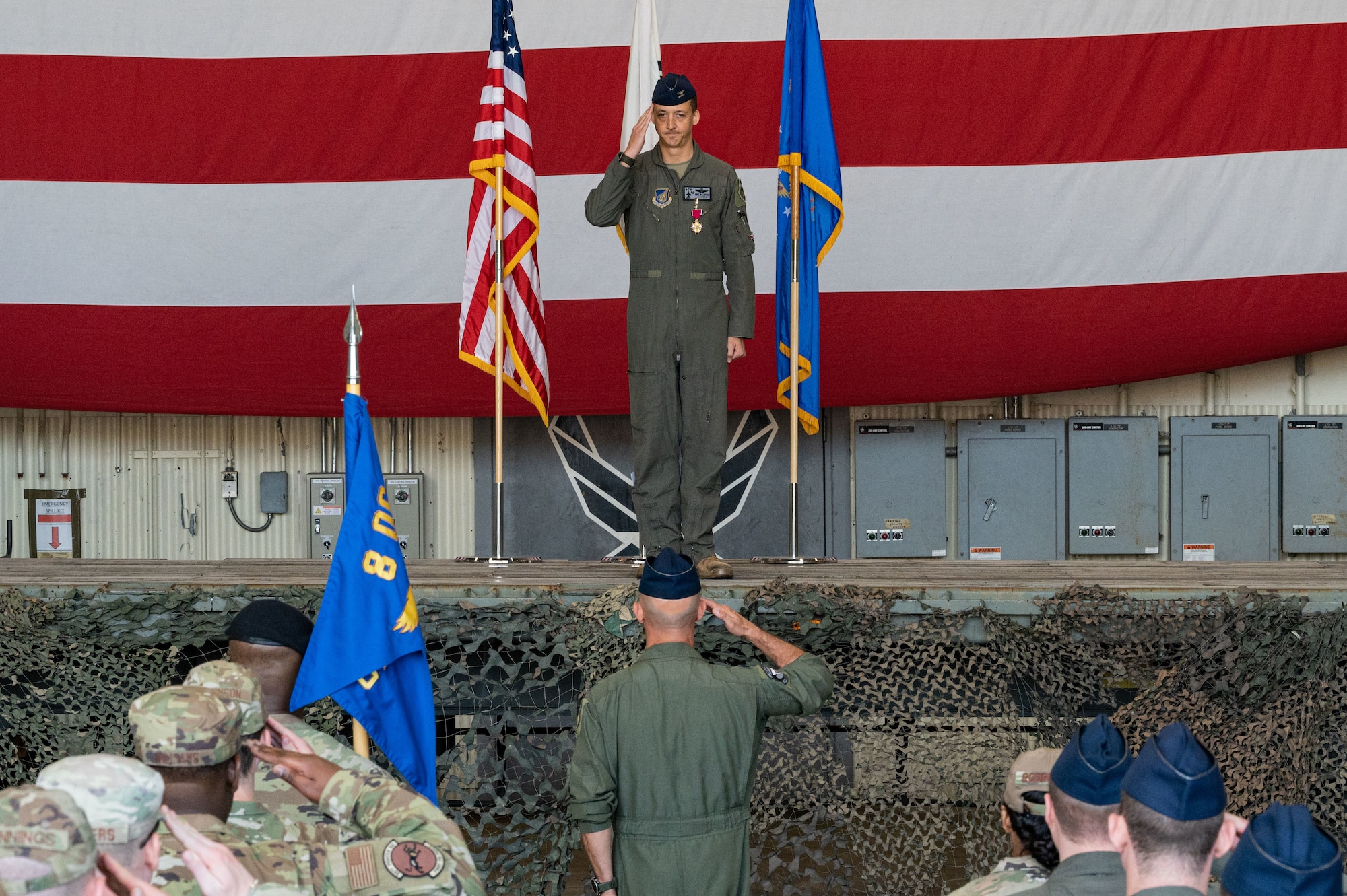 Col. Michael McCarthy, 8th Operations Group outgoing commander, renders his last salute as the commander during the 8th OG change of command ceremony.