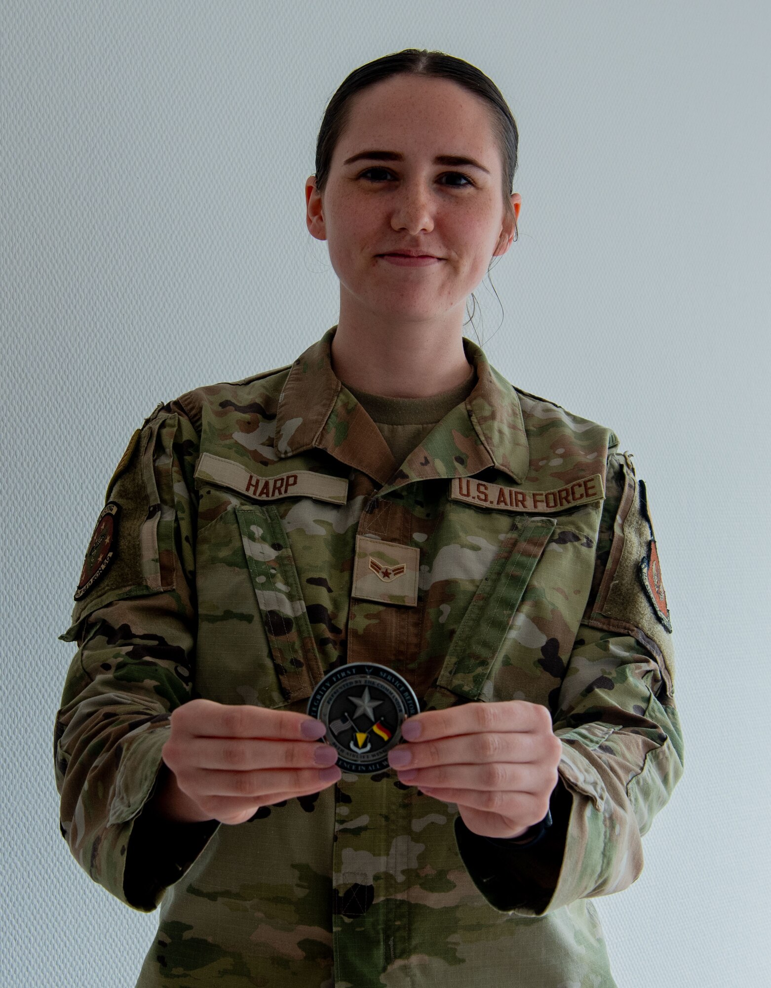 Woman holds coin