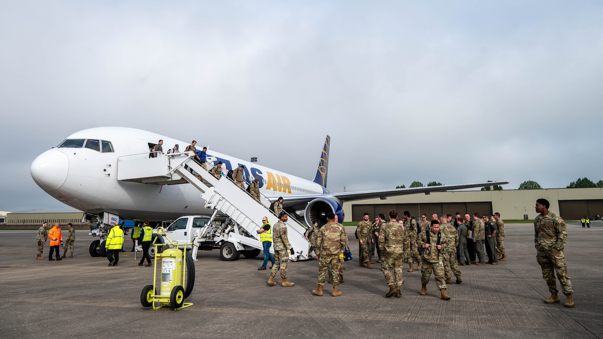 Airmen from Minot Air Base exit an Atlas Air Boeing 767 aircraft at RAF Fairford